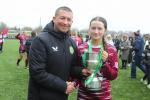 James SCOTT Under 17 Women's International Head Coach presents the Cup to Athenry Captain Kerri O'Driscoll